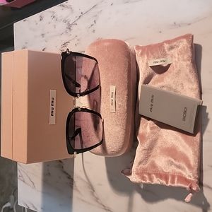 MUI MUI Luxottica Shades Black